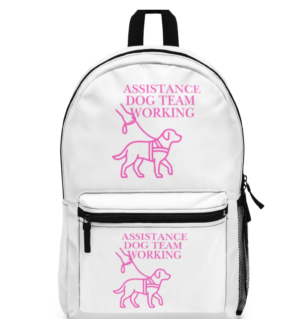 White backpack with pink text and dog illustrations on a computer screen